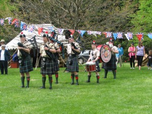 The John F. Nicoll Pipe Band performs during the opening ceremonies of St Stephen's British Garden Party and Fête.