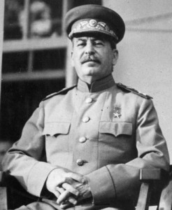 Joseph Stalin,1943 by U.S. Signal Corps photo. Licensed under Public Domain via <a href=”https://commons.wikimedia.org/wiki/File:CroppedStalin1943.jpg#/media/File:CroppedStalin1943.jpg”>Wikimedia</a>. This is a cropped image of Stalin during the Tehran Conference. In the full photo he is sitting beside Franklin D. Roosevelt, and Winston Churchill on the portico of the Russian Embassy.