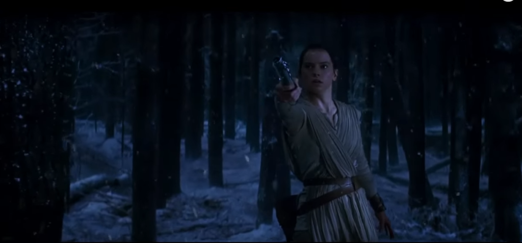 Rey takes Luke Skywalker's light sabre from Kylo Ren