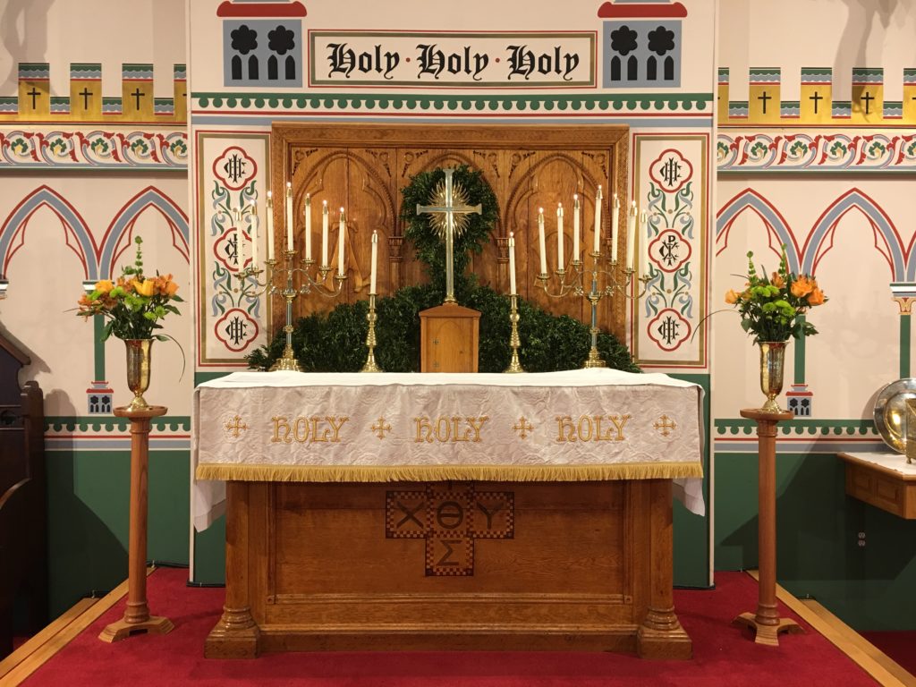 Altar Flowers — Epiphany II, 20 Januay 2019. The flowers on the altar are given to the glory of God by John P. Zebelean III in memory of Gen. Robert E. Lee.